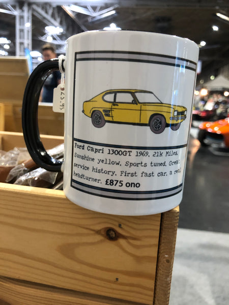 Ford Capri 1300GT yellow made to order and printed on a ceramic mug with black handle and inner including details of manufacture that include the year the colour sunshine yellow, personal details of the car and price